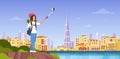 Woman Tourist With Backpack Taking Selfie Photo Over Beautiful Dubai City Background