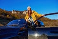 woman tourist black car nature travel adventure Fresh air Royalty Free Stock Photo