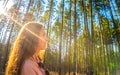 Woman tourist enjoying fresh air in the woods Royalty Free Stock Photo