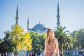 Woman tourist enjoying the view Blue Mosque, Sultanahmet Camii, Istanbul, Turkey Royalty Free Stock Photo