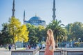 Woman tourist enjoying the view Blue Mosque, Sultanahmet Camii, Istanbul, Turkey Royalty Free Stock Photo