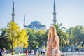 Woman tourist enjoying the view Blue Mosque, Sultanahmet Camii, Istanbul, Turkey Royalty Free Stock Photo