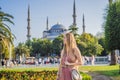 Woman tourist enjoying the view Blue Mosque, Sultanahmet Camii, Istanbul, Turkey Royalty Free Stock Photo