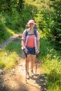 Woman tourist in front of the mountain