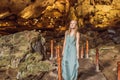 Woman tourist in Hang Sung Sot Grotto Cave of Surprises, Halong Bay, Vietnam Royalty Free Stock Photo