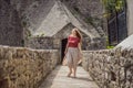 Woman tourist in Herceg Novi old town. Historical and touristic center of Herceg Novi. Montenegro Royalty Free Stock Photo