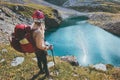 Woman tourist hiking in mountains Travel Lifestyle adventure concept happy emotions summer vacations outdoor explorer with backpac Royalty Free Stock Photo