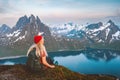 Woman tourist hiking in Norway outdoor active girl traveling with backpack healthy lifestyle in mountains Royalty Free Stock Photo