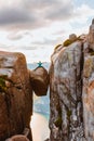 Woman tourist on Kjeragbolten Travel Norway Kjerag mountains