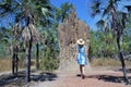 Woman tourist looking at Cathedral termite mound in Northern Ter Royalty Free Stock Photo