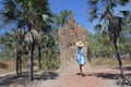 Woman tourist looking at Cathedral termite mound in Northern Territory Australia Royalty Free Stock Photo