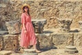 Woman tourist near the base of an old ruined chapel at the grave of Saint Louis in Tunis, Carthage Royalty Free Stock Photo