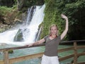 The woman tourist near Dunn's River Jamaica falls