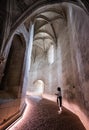 Tourist in passageway of ChÃÂ¢teau d'Amboise in the Loire Valley of France