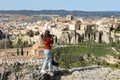 Woman tourist with photo camera, Cuenca, Spain Royalty Free Stock Photo