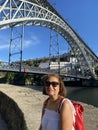 Woman Tourist at the Porto River Bridge in Portugal