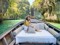 Woman tourist in private longtail boat trip to Lagoon koh hong near Hong island, Krabi, Thailand. landmark, destination, Asia Royalty Free Stock Photo