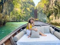 Woman tourist in private longtail boat trip to Lagoon koh hong near Hong island, Krabi, Thailand. landmark, destination, Asia Royalty Free Stock Photo