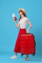 woman tourist red suitcase vacation fun sunglasses travel Royalty Free Stock Photo