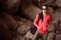 Woman tourist in the rocky grot Royalty Free Stock Photo