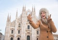 Woman tourist showing victory gesture and taking selfie in Milan Royalty Free Stock Photo