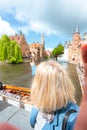 Woman tourist sightseeing Bruges, Belgium Royalty Free Stock Photo