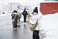 Woman tourist sightseeing in Niseko city with Snow in winter season. landmark and popular for attractions in Hokkaido, Japan.