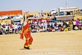 Woman tourist in traditional Indian Sari with earthen pot