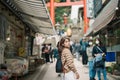 Woman tourist Visiting in Enoshima Island, Fujisawa, Kanagawa, Japan. happy Traveler sightseeing Enoshima Shrine. Landmark and Royalty Free Stock Photo