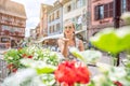 Woman tourist visiting the town of Colmar, Alsace, France