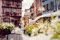 Woman tourist visiting the town of Colmar, Alsace, France