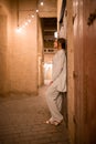 Woman tourist walking in Al Seef Meraas Dubai - old historical district with traditional Arabic architecture Royalty Free Stock Photo