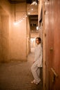 Woman tourist walking in Al Seef Meraas Dubai - old historical district with traditional Arabic architecture Royalty Free Stock Photo