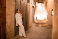 Woman tourist walking in Al Seef Meraas Dubai - old historical district with traditional Arabic architecture Royalty Free Stock Photo