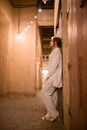 Woman tourist walking in Al Seef Meraas Dubai - old historical district with traditional Arabic architecture Royalty Free Stock Photo