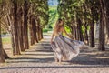 Woman tourist walking in Montenegro. Panoramic summer landscape of the beautiful green Royal park Milocer on the shore Royalty Free Stock Photo