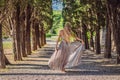 Woman tourist walking in Montenegro. Panoramic summer landscape of the beautiful green Royal park Milocer on the shore Royalty Free Stock Photo