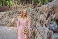 Woman tourist walking together in Montenegro. Panoramic summer landscape of the beautiful green Royal park Milocer on Royalty Free Stock Photo