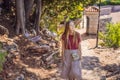 Woman tourist walking together in Montenegro. Panoramic summer landscape of the beautiful green Royal park Milocer on Royalty Free Stock Photo