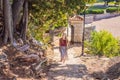 Woman tourist walking together in Montenegro. Panoramic summer landscape of the beautiful green Royal park Milocer on Royalty Free Stock Photo