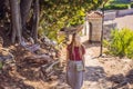 Woman tourist walking together in Montenegro. Panoramic summer landscape of the beautiful green Royal park Milocer on Royalty Free Stock Photo