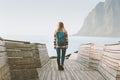 Woman tourist walking on wooden bridge in Norway solo travel active healthy lifestyle outdoor