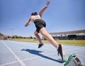 Woman track runner, start running and sprint training for race exercise, fitness workout and using starting blocks for