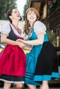 Woman in traditional austrian Clothes having Fun