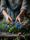 Woman in traditional dress making a wreath of wildflowers and herbs. Decoration for midsummer celebration. Generative AI Royalty Free Stock Photo