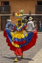 Woman in traditional garb with fruit on her head, Cartagena, Colombia