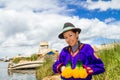 Woman in traditional indigenous clothing, Peru