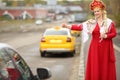 Woman in traditional russian clothes and kokoshnik