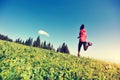 Woman trail runner running on beautiful mountain peak Royalty Free Stock Photo