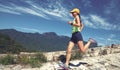 Woman trail runner running on the great wall top of mountain Royalty Free Stock Photo